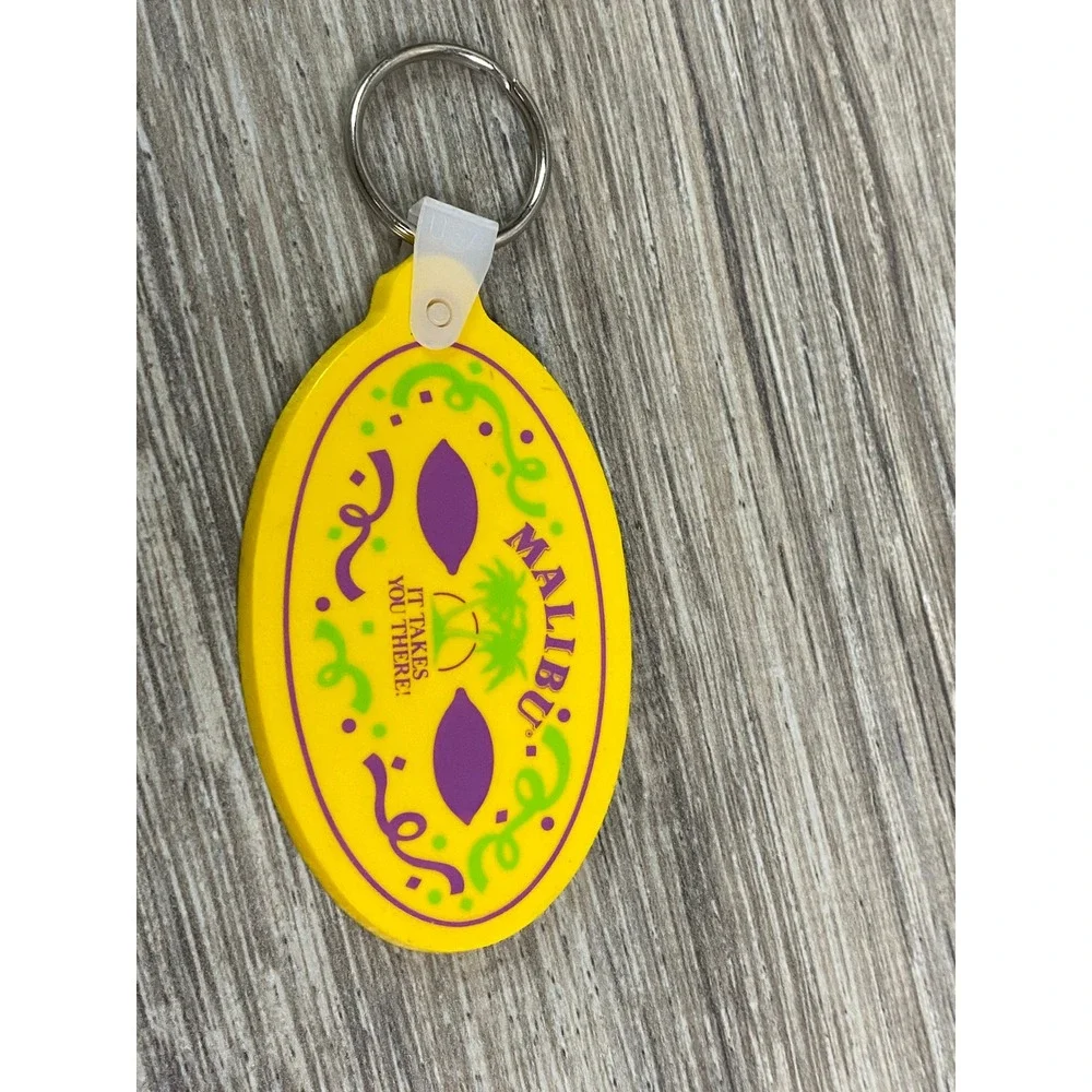 Vintage Malibu Rum‎ Yellow Rubber Keychain Mardi Gras Carnival Logo USA Made